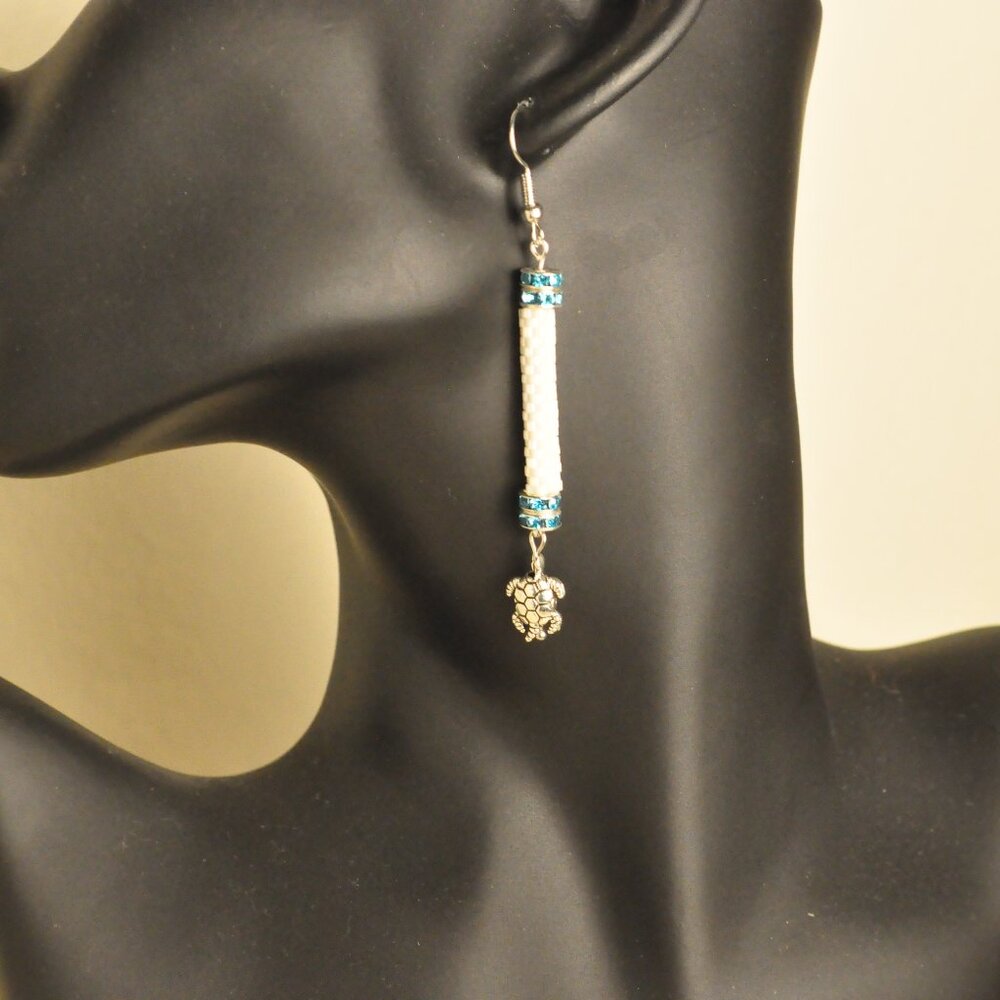 White Beaded Earrings with Turtle Detail